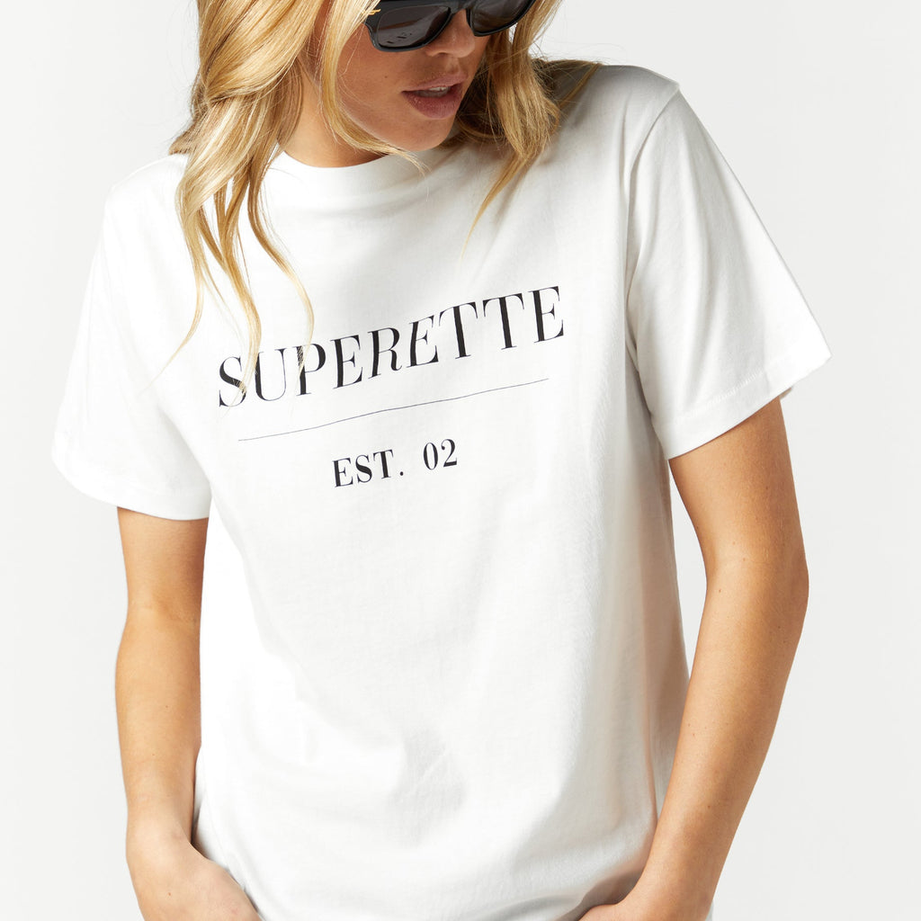 SUPERWOMAN Essential T-Shirt for Sale by Otero Mccabe