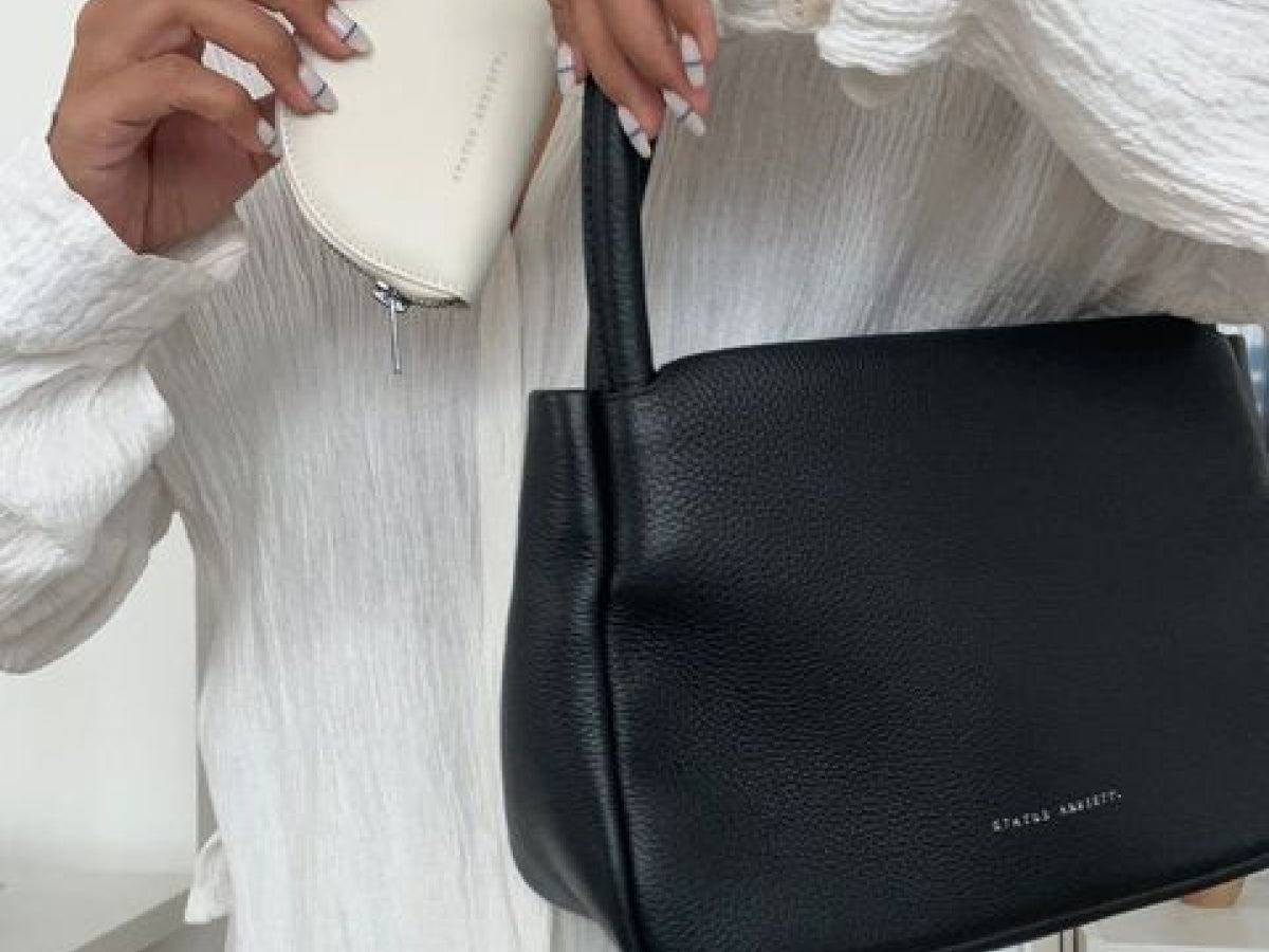 Status anxiety fur bag sales