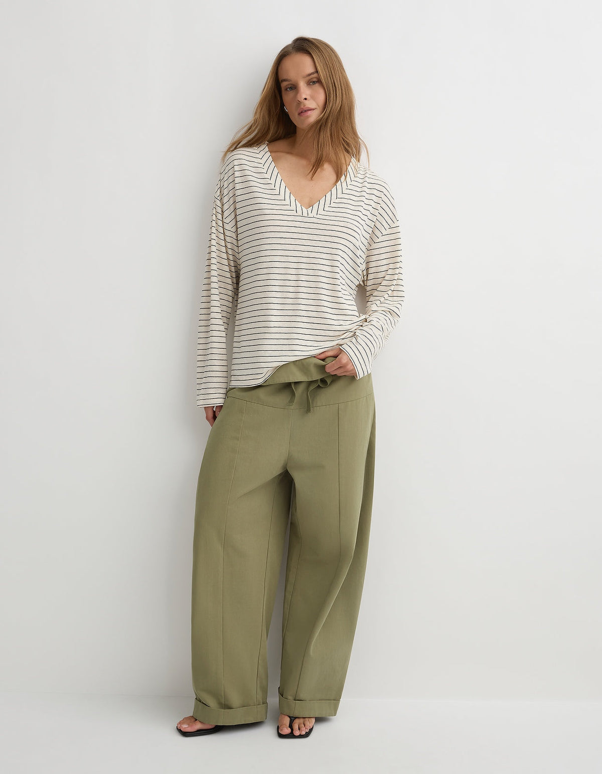 Herbert The Dylan L/S in cream and black stripe, worn with the Otto Pant