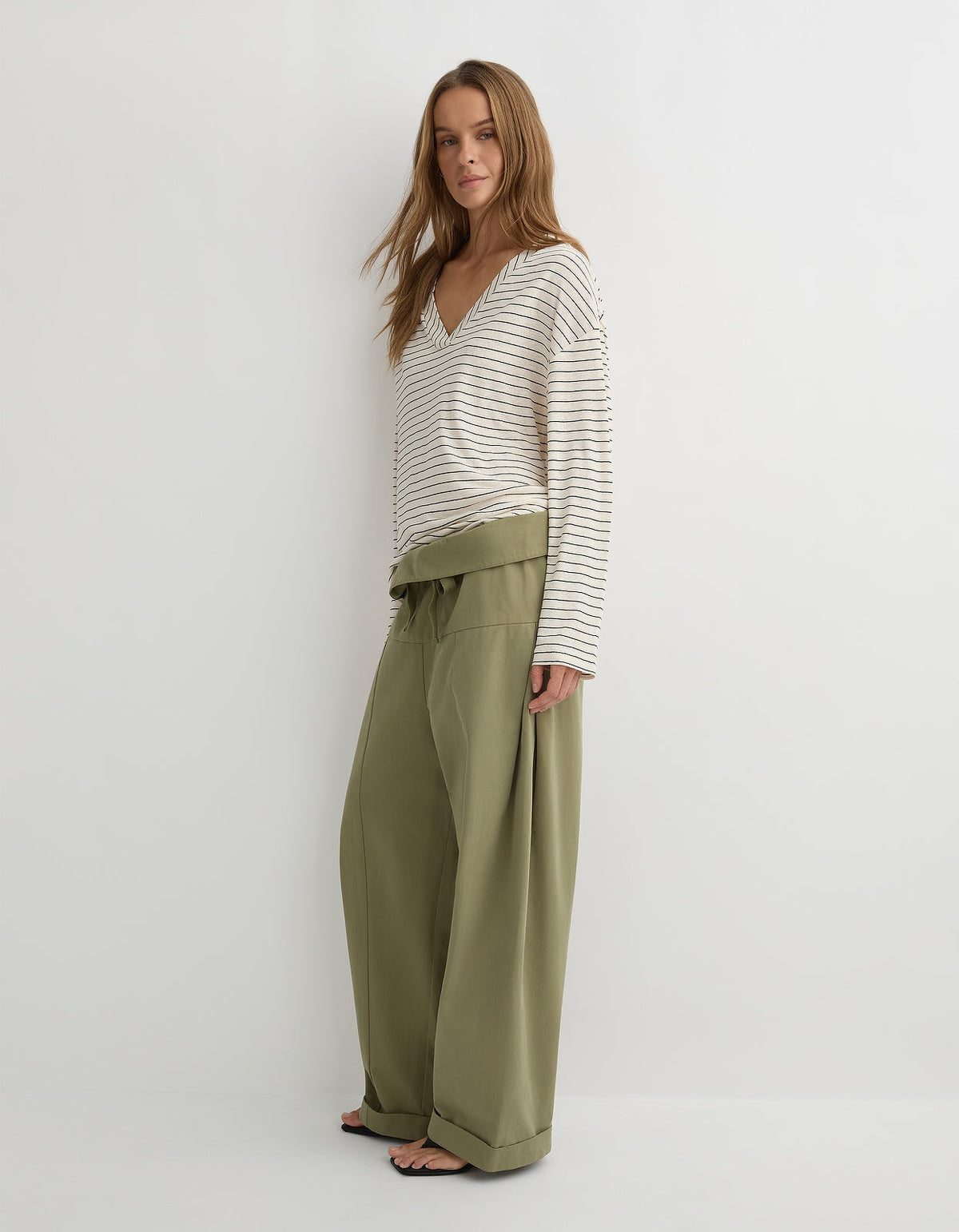 Herbert The Dylan L/S in cream and black stripe, side view showing the relaxed shape