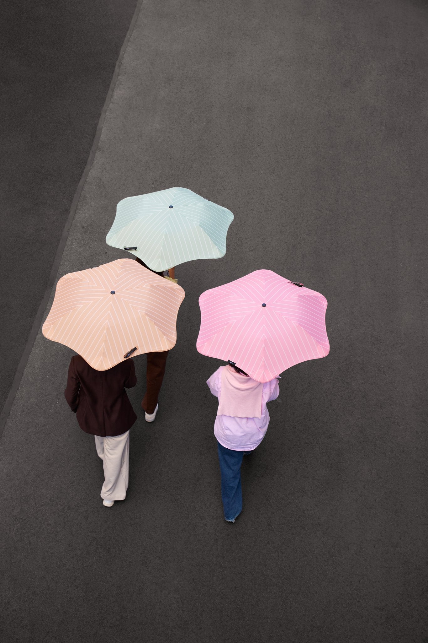 BLUNT Metro umbrellas overhead street shot